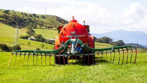 Red tractor in field