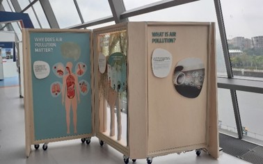 Mobile exhibit showing picture of body and pollution effects